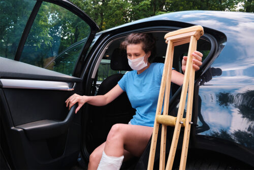 image of a woman after a car accident at her personal injury attorney's toledo office