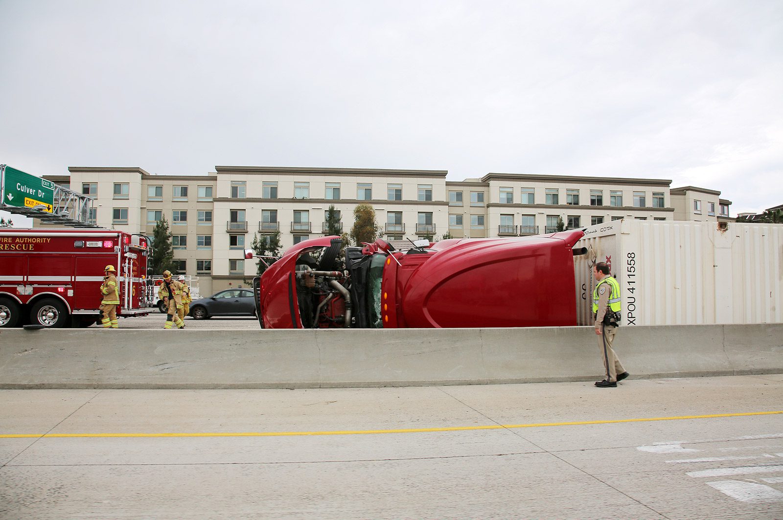 Serious semi-truck accident on a busy highway.