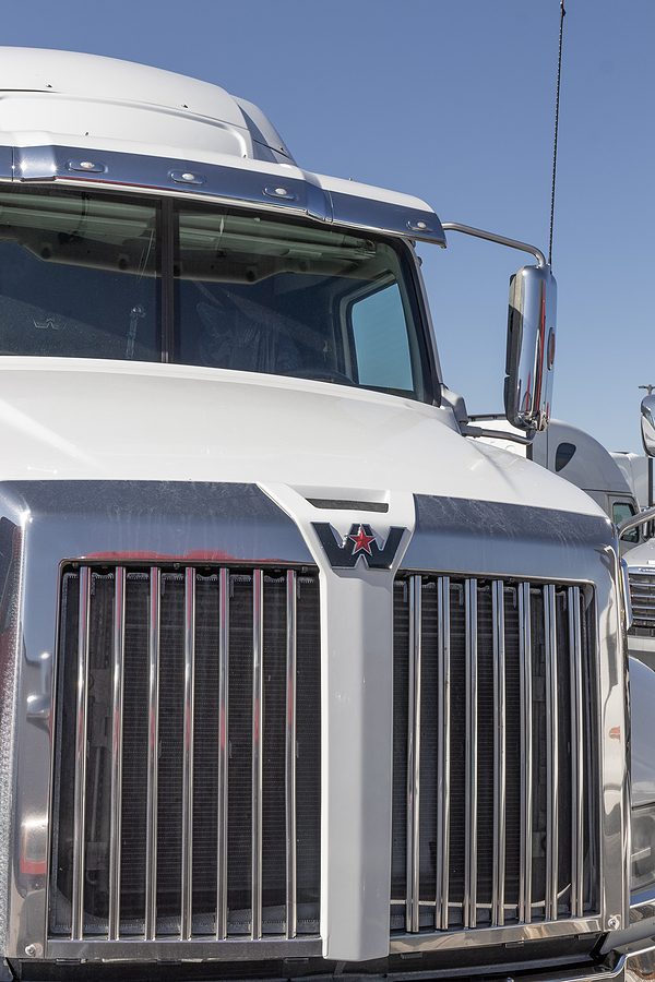 close up photo of the front of a semi truck