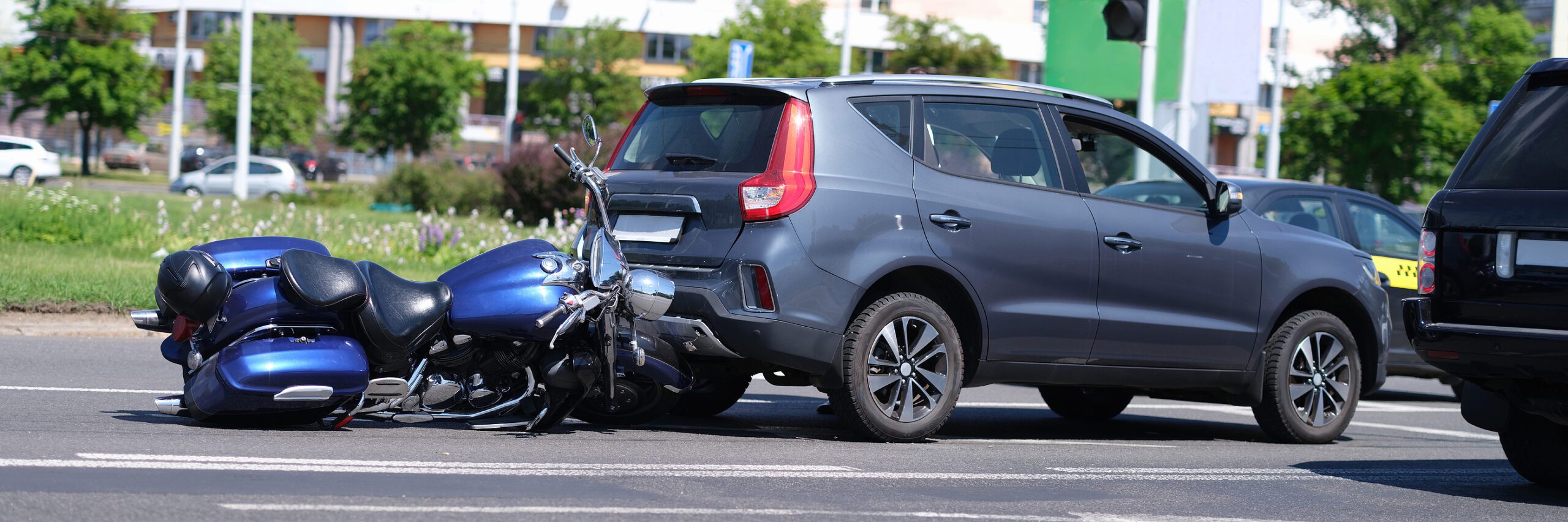 motorcycle crashed into back of car on road in toledo ohio
