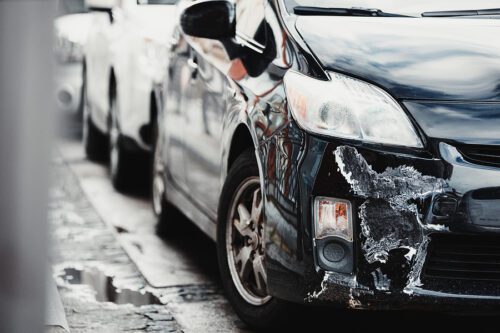 Broken Scratched And Dented Car after Collision in Rossford, Ohio.