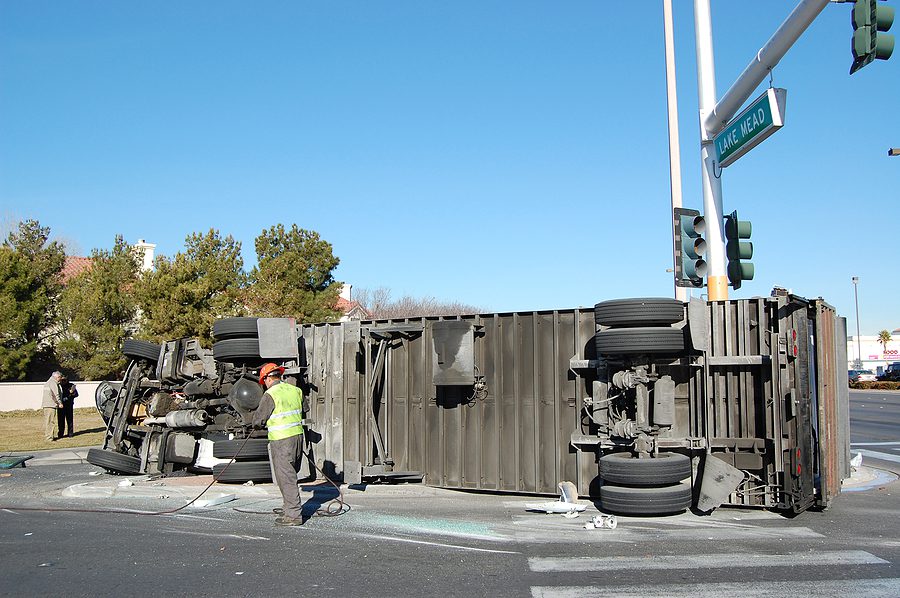 Overturned truck after driver failed to stop at a light in Monclova Ohio