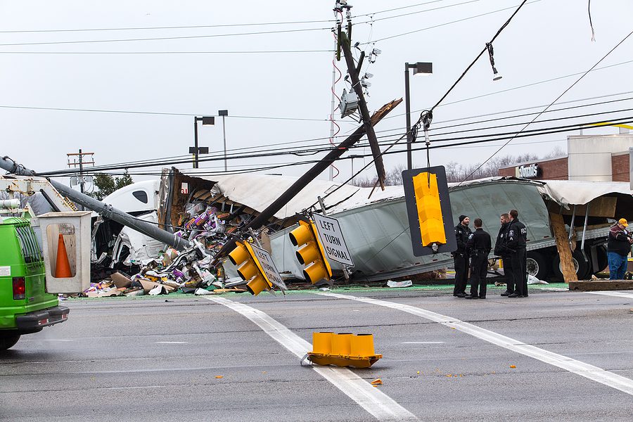 mangled truck after collision in Delta, Ohio intersection