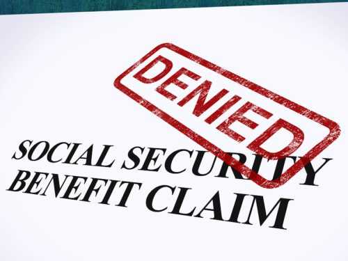 Social security claim with the word denial stamped in red ink. 