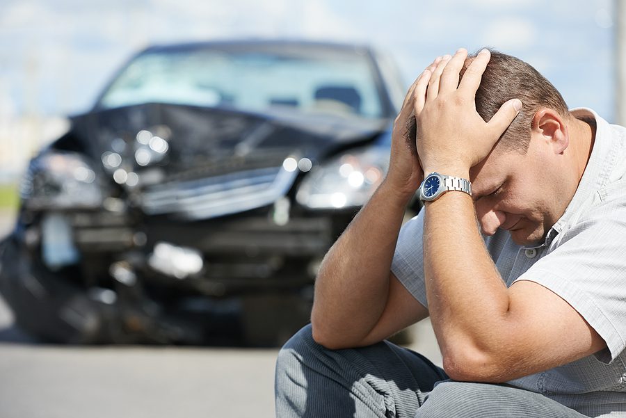 Adult driver man in front of automobile crash in Liberty Center, Ohio