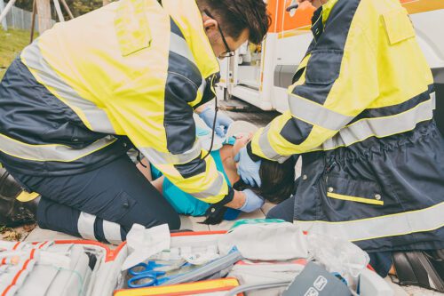 Paramedics assisted a badly injured accident victim.